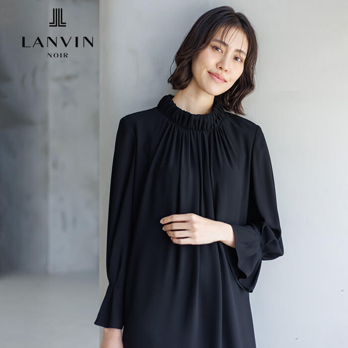 刺繍が裾を彩るモダンなアンサンブル 13号・ブラック｜東京ソワール