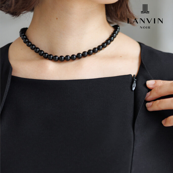 上品なフリルがポイントのエレガントなアンサンブル 13号・ブラック